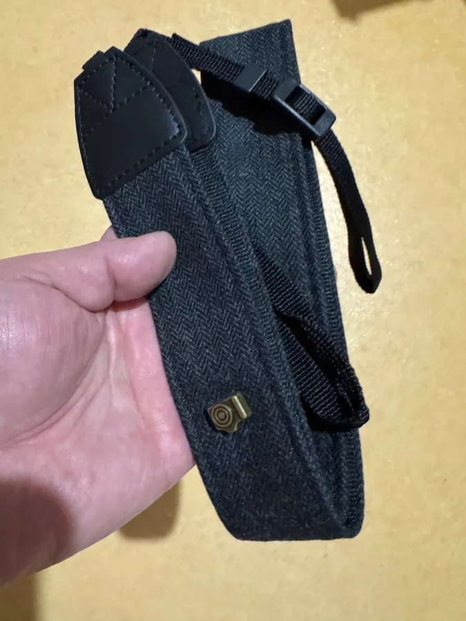 Cotton and leather camera strap photographed by a verified buyer
