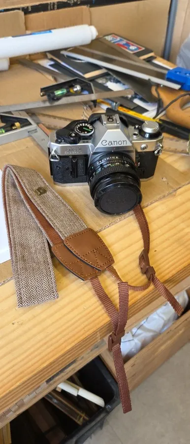 Cotton and leather camera strap photographed by a verified buyer