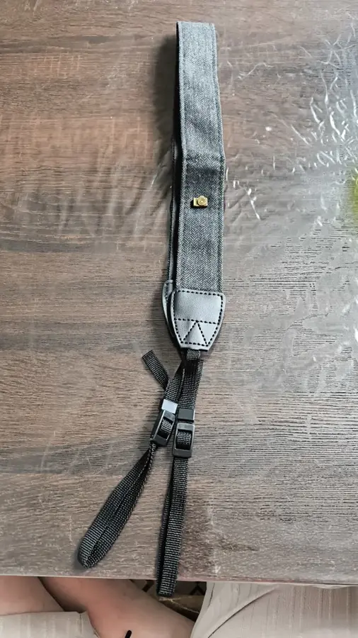 Cotton and leather camera strap photographed by a verified buyer