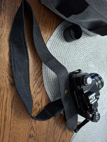 Cotton and leather camera strap photographed by a verified buyer